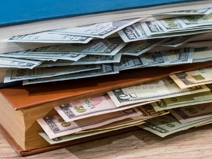 cash as bookmarks in book